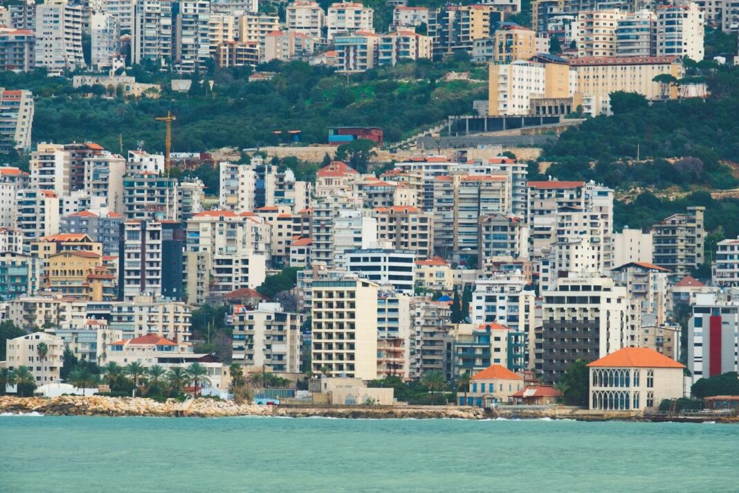 Panoramic view of dense residential buildings along Jounieh's waterfront in Lebanon, highlighting urban architecture.